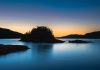 Petit-Saguenay admis au sein de l’Association des plus beaux villages du Québec Une île sur l fjord du Saguenay au moment du coucher de soleil